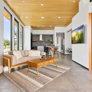 A living room with a couch and table in it